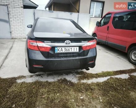Чорний Тойота Камрі, об'ємом двигуна 2.5 л та пробігом 124 тис. км за 13500 $, фото 1 на Automoto.ua