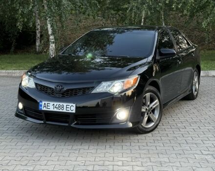 Черный Тойота Камри, объемом двигателя 2.5 л и пробегом 198 тыс. км за 10900 $, фото 1 на Automoto.ua