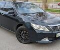 Черный Тойота Камри, объемом двигателя 2.5 л и пробегом 186 тыс. км за 13500 $, фото 1 на Automoto.ua
