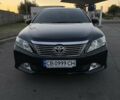 Чорний Тойота Камрі, об'ємом двигуна 2.49 л та пробігом 191 тис. км за 14000 $, фото 1 на Automoto.ua