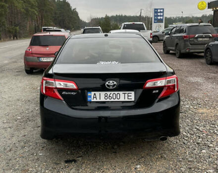 Черный Тойота Камри, объемом двигателя 2.5 л и пробегом 252 тыс. км за 10500 $, фото 7 на Automoto.ua