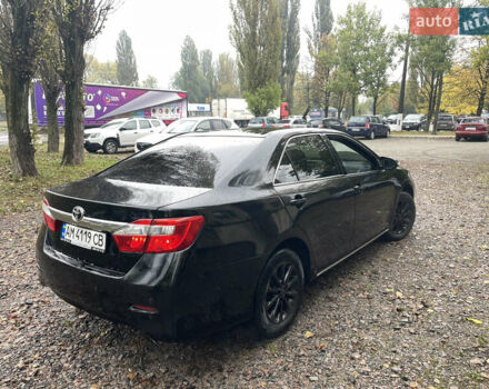 Черный Тойота Камри, объемом двигателя 2.36 л и пробегом 230 тыс. км за 10250 $, фото 13 на Automoto.ua