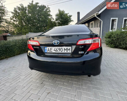 Черный Тойота Камри, объемом двигателя 2.5 л и пробегом 225 тыс. км за 13950 $, фото 12 на Automoto.ua