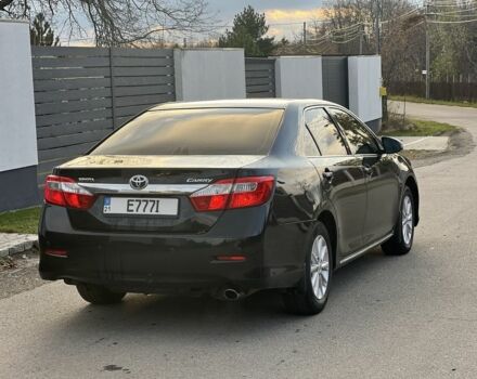 Черный Тойота Камри, объемом двигателя 2.5 л и пробегом 235 тыс. км за 10200 $, фото 2 на Automoto.ua