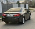Черный Тойота Камри, объемом двигателя 2.5 л и пробегом 235 тыс. км за 10200 $, фото 2 на Automoto.ua