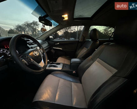 Черный Тойота Камри, объемом двигателя 2.5 л и пробегом 215 тыс. км за 11950 $, фото 25 на Automoto.ua