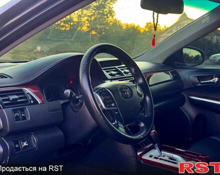 Черный Тойота Камри, объемом двигателя 2.5 л и пробегом 178 тыс. км за 12350 $, фото 4 на Automoto.ua