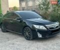 Черный Тойота Камри, объемом двигателя 2.49 л и пробегом 255 тыс. км за 10599 $, фото 1 на Automoto.ua