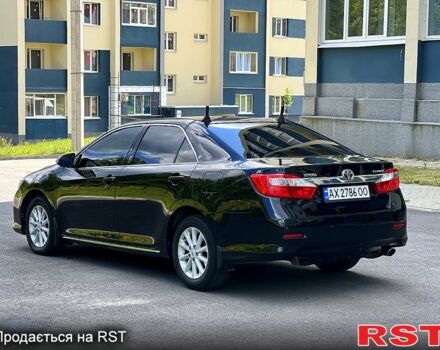 Чорний Тойота Камрі, об'ємом двигуна 2.5 л та пробігом 250 тис. км за 13500 $, фото 5 на Automoto.ua