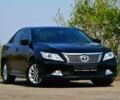 Черный Тойота Камри, объемом двигателя 25 л и пробегом 100 тыс. км за 15200 $, фото 1 на Automoto.ua