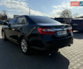 Чорний Тойота Камрі, об'ємом двигуна 2.49 л та пробігом 305 тис. км за 11800 $, фото 6 на Automoto.ua