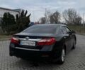 Черный Тойота Камри, объемом двигателя 2.5 л и пробегом 239 тыс. км за 12600 $, фото 1 на Automoto.ua