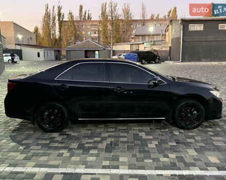 Чорний Тойота Камрі, об'ємом двигуна 2.5 л та пробігом 216 тис. км за 13000 $, фото 3 на Automoto.ua