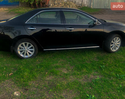 Чорний Тойота Камрі, об'ємом двигуна 2.5 л та пробігом 236 тис. км за 15200 $, фото 4 на Automoto.ua