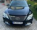 Черный Тойота Камри, объемом двигателя 2.49 л и пробегом 180 тыс. км за 11500 $, фото 1 на Automoto.ua