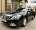 Черный Тойота Камри, объемом двигателя 2.5 л и пробегом 177 тыс. км за 14700 $, фото 1 на Automoto.ua