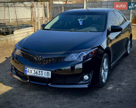 Чорний Тойота Камрі, об'ємом двигуна 2.49 л та пробігом 245 тис. км за 12200 $, фото 2 на Automoto.ua