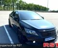 Черный Тойота Камри, объемом двигателя 2.5 л и пробегом 238 тыс. км за 14700 $, фото 1 на Automoto.ua