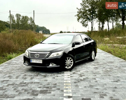 Черный Тойота Камри, объемом двигателя 2.5 л и пробегом 260 тыс. км за 10999 $, фото 19 на Automoto.ua