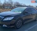 Черный Тойота Камри, объемом двигателя 2.5 л и пробегом 350 тыс. км за 13500 $, фото 1 на Automoto.ua