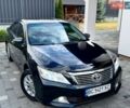 Черный Тойота Камри, объемом двигателя 2.5 л и пробегом 180 тыс. км за 14440 $, фото 1 на Automoto.ua