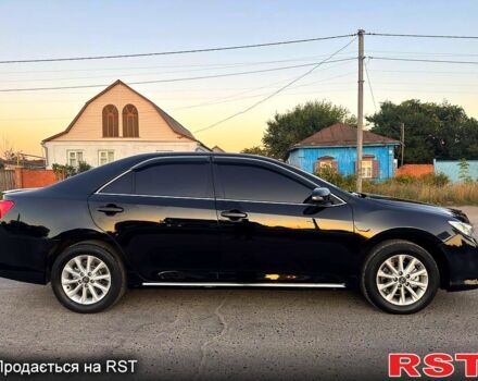 Черный Тойота Камри, объемом двигателя 2.5 л и пробегом 178 тыс. км за 12350 $, фото 2 на Automoto.ua