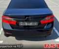 Черный Тойота Камри, объемом двигателя 2.5 л и пробегом 238 тыс. км за 14700 $, фото 2 на Automoto.ua