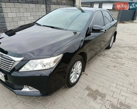 Чорний Тойота Камрі, об'ємом двигуна 2.5 л та пробігом 176 тис. км за 13499 $, фото 1 на Automoto.ua