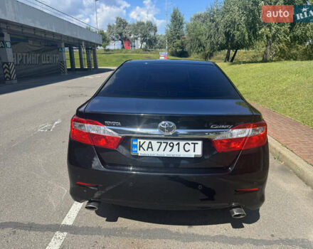 Черный Тойота Камри, объемом двигателя 2.5 л и пробегом 275 тыс. км за 10200 $, фото 4 на Automoto.ua