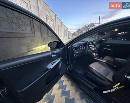 Черный Тойота Камри, объемом двигателя 2.5 л и пробегом 215 тыс. км за 11950 $, фото 24 на Automoto.ua