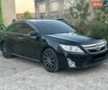 Черный Тойота Камри, объемом двигателя 2.49 л и пробегом 255 тыс. км за 11200 $, фото 1 на Automoto.ua