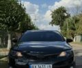 Чорний Тойота Камрі, об'ємом двигуна 2.5 л та пробігом 250 тис. км за 10999 $, фото 1 на Automoto.ua
