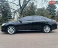 Черный Тойота Камри, объемом двигателя 2.5 л и пробегом 127 тыс. км за 15700 $, фото 1 на Automoto.ua