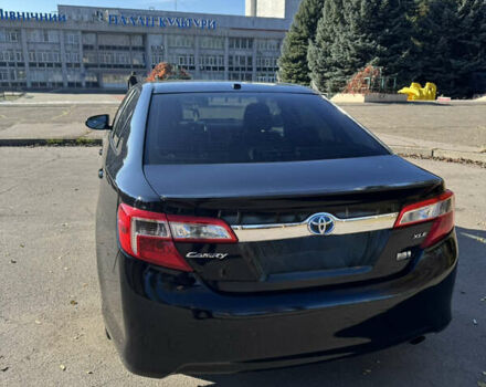 Черный Тойота Камри, объемом двигателя 2.49 л и пробегом 215 тыс. км за 13800 $, фото 1 на Automoto.ua
