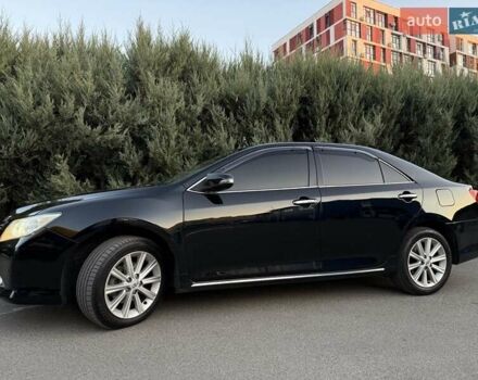 Черный Тойота Камри, объемом двигателя 2.49 л и пробегом 186 тыс. км за 13700 $, фото 7 на Automoto.ua