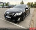 Черный Тойота Камри, объемом двигателя 2.5 л и пробегом 240 тыс. км за 11000 $, фото 1 на Automoto.ua