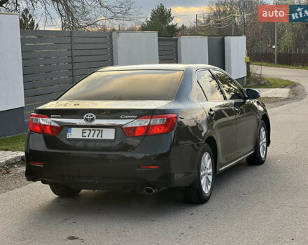Чорний Тойота Камрі, об'ємом двигуна 2.5 л та пробігом 227 тис. км за 10500 $, фото 3 на Automoto.ua