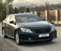 Черный Тойота Камри, объемом двигателя 2.5 л и пробегом 235 тыс. км за 10200 $, фото 1 на Automoto.ua