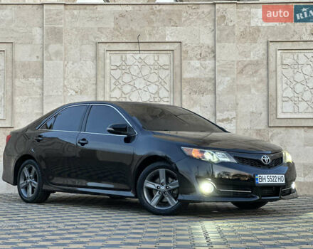 Черный Тойота Камри, объемом двигателя 2.5 л и пробегом 215 тыс. км за 11950 $, фото 4 на Automoto.ua