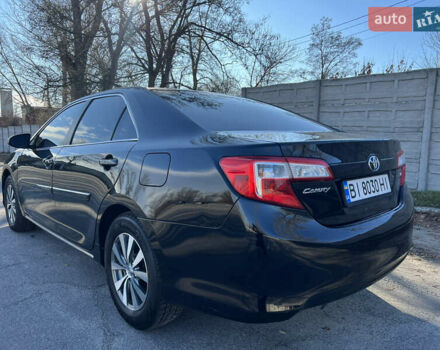 Чорний Тойота Камрі, об'ємом двигуна 2.5 л та пробігом 155 тис. км за 12000 $, фото 3 на Automoto.ua