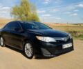 Черный Тойота Камри, объемом двигателя 2.49 л и пробегом 196 тыс. км за 8900 $, фото 1 на Automoto.ua