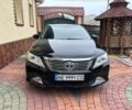 Чорний Тойота Камрі, об'ємом двигуна 2.5 л та пробігом 215 тис. км за 14000 $, фото 1 на Automoto.ua