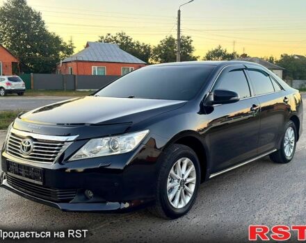 Черный Тойота Камри, объемом двигателя 2.5 л и пробегом 178 тыс. км за 12350 $, фото 1 на Automoto.ua