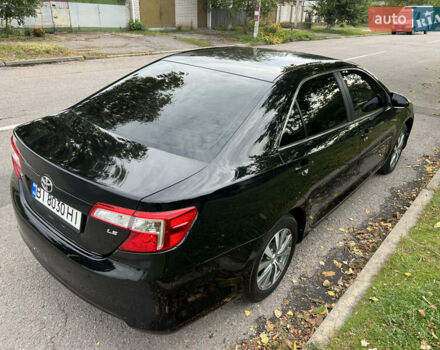 Черный Тойота Камри, объемом двигателя 2.5 л и пробегом 155 тыс. км за 12000 $, фото 5 на Automoto.ua