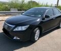 Черный Тойота Камри, объемом двигателя 2.5 л и пробегом 122 тыс. км за 23000 $, фото 1 на Automoto.ua