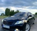 Черный Тойота Камри, объемом двигателя 2.5 л и пробегом 245 тыс. км за 11200 $, фото 1 на Automoto.ua