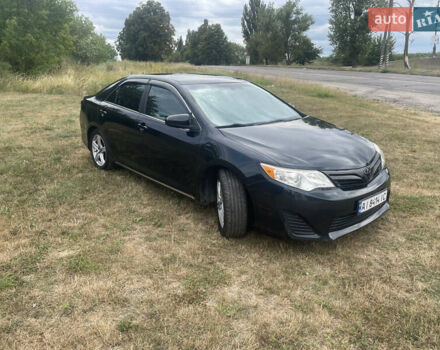 Черный Тойота Камри, объемом двигателя 2.5 л и пробегом 250 тыс. км за 10900 $, фото 4 на Automoto.ua