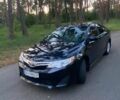 Черный Тойота Камри, объемом двигателя 2.5 л и пробегом 235 тыс. км за 10399 $, фото 1 на Automoto.ua