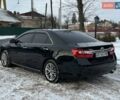 Черный Тойота Камри, объемом двигателя 2.5 л и пробегом 283 тыс. км за 11800 $, фото 7 на Automoto.ua