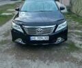 Чорний Тойота Камрі, об'ємом двигуна 2.5 л та пробігом 200 тис. км за 13500 $, фото 1 на Automoto.ua